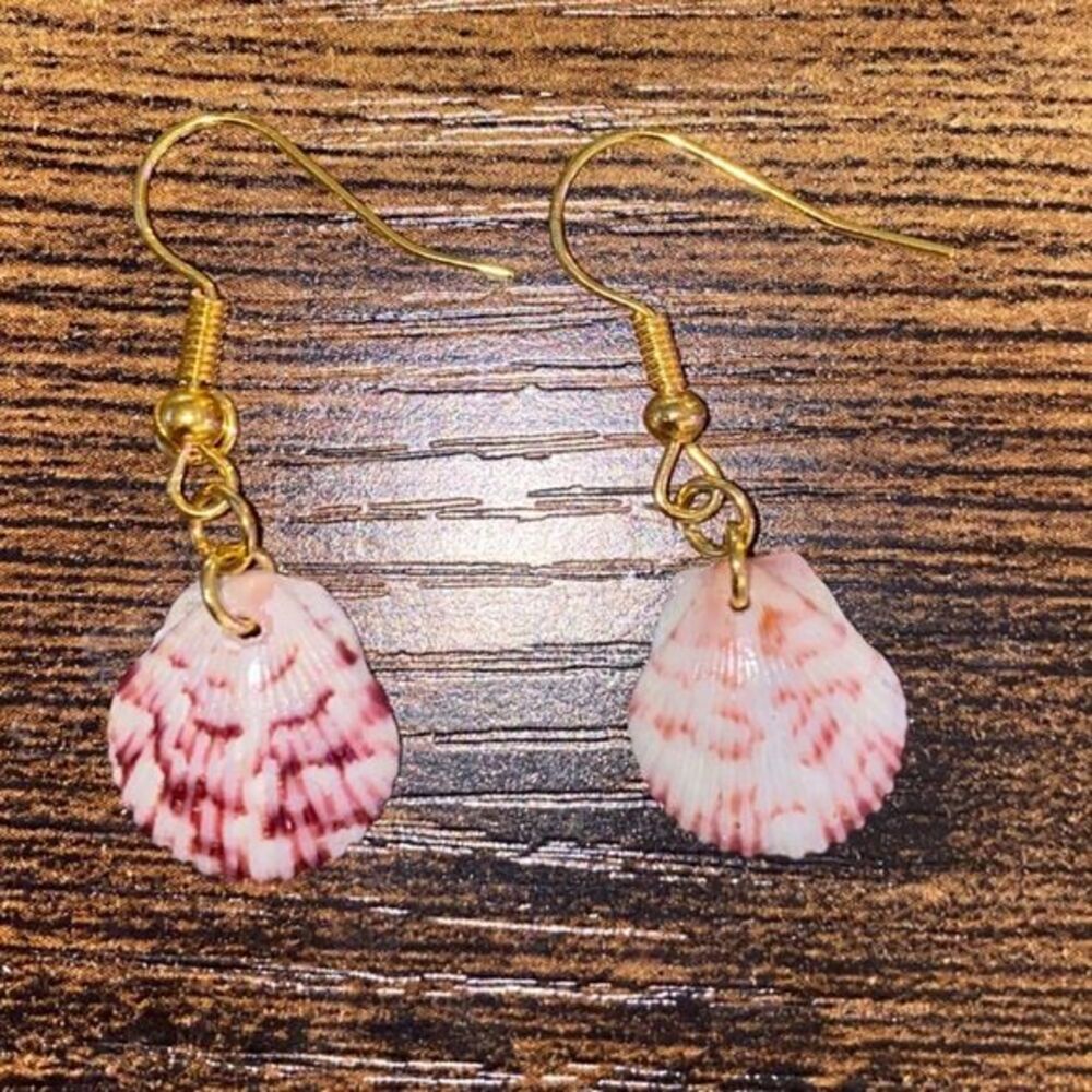 purple scallop earrings from sells off venice beach fl E10